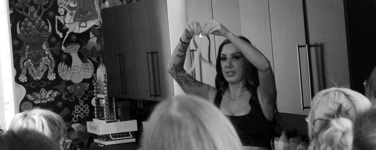 An Indie Educator teaching a hair color class in a salon